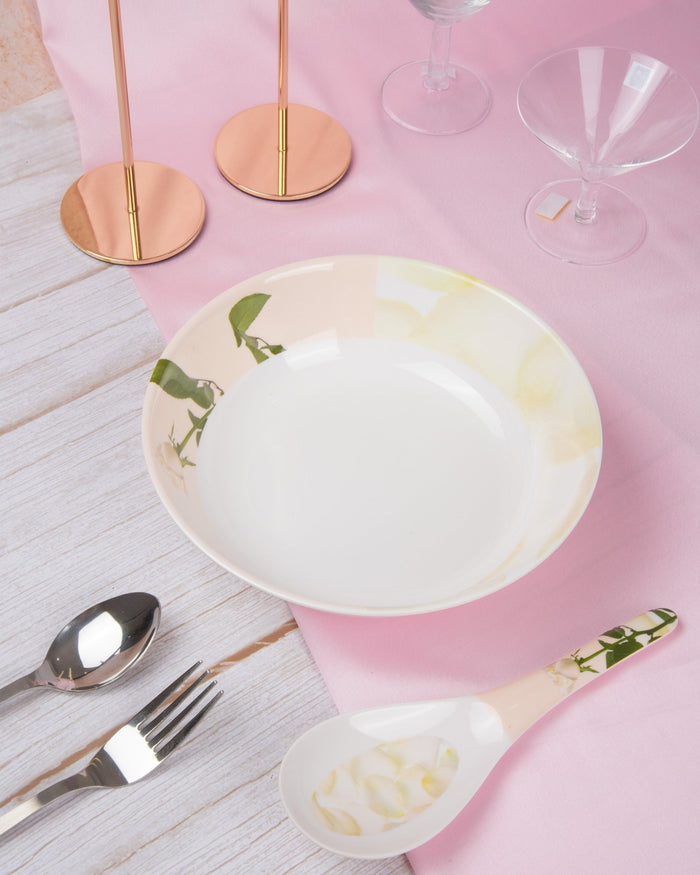 Melamine serving bowl in white with pale rose print, wide rim and shallow shape