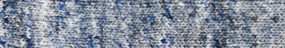 Close up of knitted fabric using Noro yarn in Ruri color; Shade in combinations of light blue, dark blue, and white