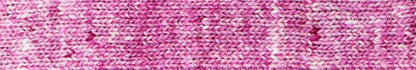 Close up of knitted pattern using Noro yarn in Botan color; Shade is combination of hot pink, light pink, and white