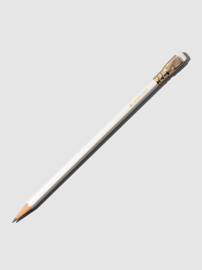 White wooden pencil displayed on a neutral background.