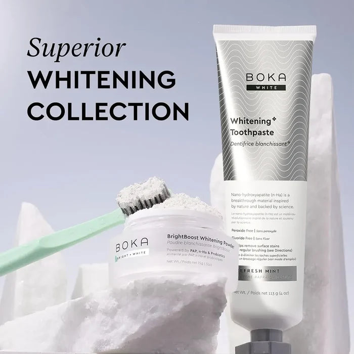 BrightBoost Whitening Kit with fluoride-free powder and green toothbrush on marble surface.