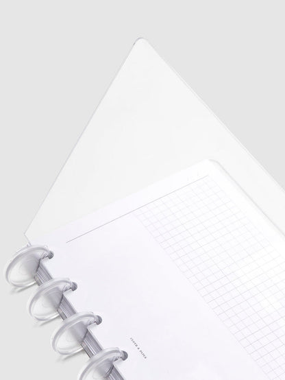 Crystal Clear Discbound Notebook Cover, HP Mini, Cloth and Paper. Close up image of notebook covers in use with clear rings and an insert. The front cover is opened halfway.