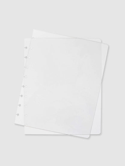 Crystal Clear Discbound Notebook Cover, HP Classic, Cloth and Paper. Two transparent notebook covers laid on top of one another with the top cover tilted slightly to the right.
