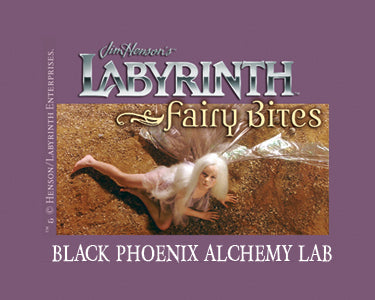 Promotional image for 'Labyrinth Fairy Bites' by Black Phoenix Alchemy Lab with a fairy figure on sand.
