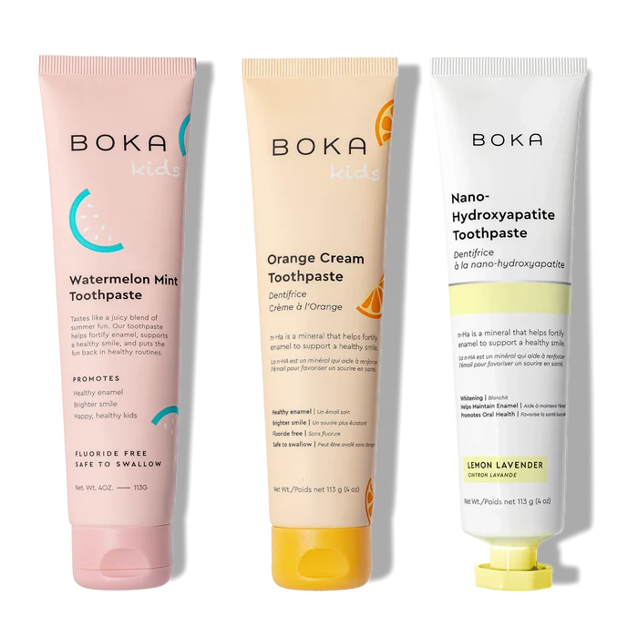 Three Boka toothpaste tubes on a white background