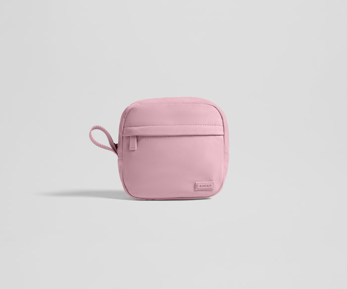 Pink tech case on a light gray background
