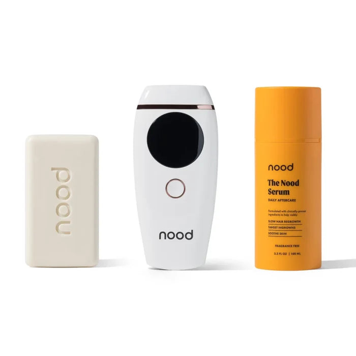 Nood Flasher 2.0 Kit in white including Buff Bar soap, Flasher 2.0 IPL hair removal device, and Nood Serum daily aftercare on white background