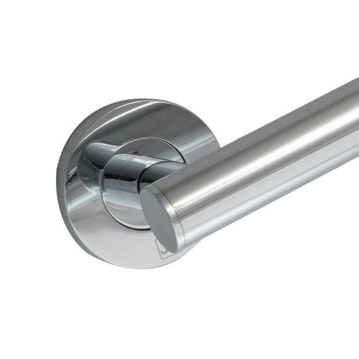 A close-up of a chrome wall-mounted bathroom grab bar with a circular backplate.