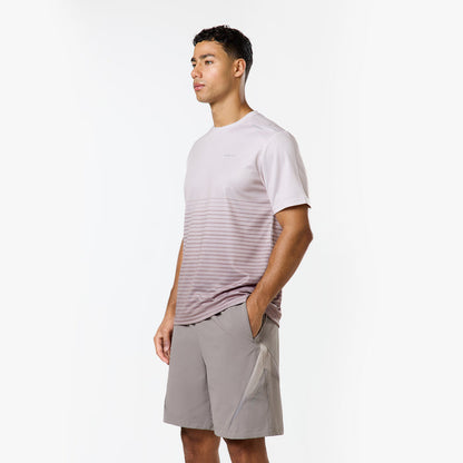 Model is wearing the tri-set gradient grey and white striped top and matching grey shorts