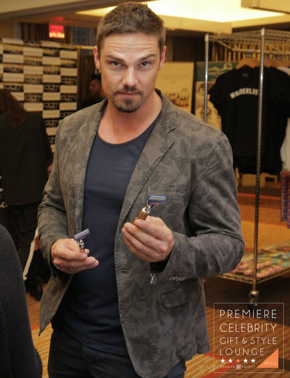 Celebrity Tom Hardy posing with a Kings Crown Shiny Nickel Safety Razor