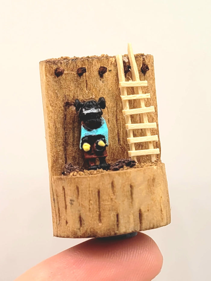 Little Figurine in Wood Stump Toy