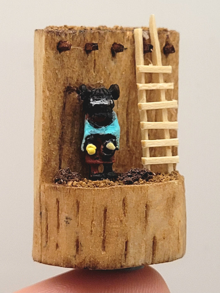 Little Figurine in Wood Stump Toy