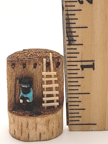 Little Figurine in Wood Stump Toy