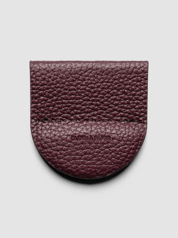 Image shows the Magnetic Bookmark | Pen Holder in Bordeaux, a deep red, displayed on a neutral background.