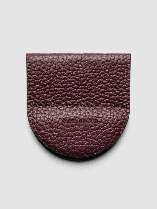 Image shows the Magnetic Bookmark | Pen Holder in Bordeaux, a deep red, displayed on a neutral background.