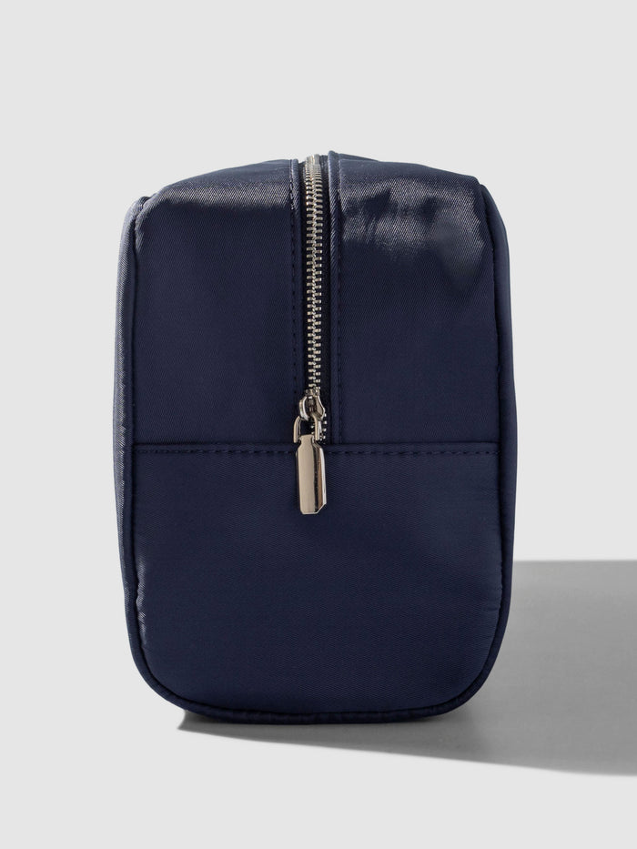 Nylon Travel Pouch, Apollo, Cloth and Paper. Pouch shown from the side on a neutral background, zipper side exposed.