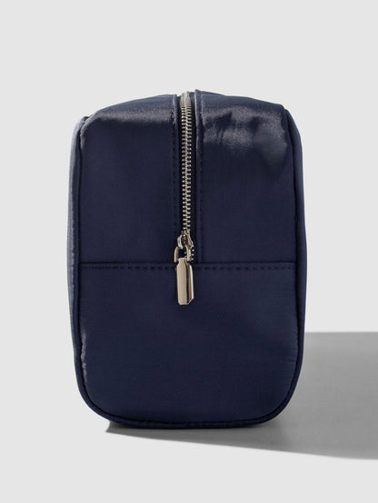 Nylon Travel Pouch, Apollo, Cloth and Paper. Pouch shown from the side on a neutral background, zipper side exposed.