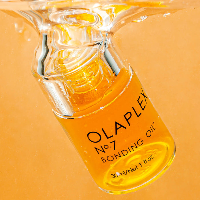 Olaplex No.7 Bonding Oil for hair care, 30ml bottle with dropper applicator, enhances shine and reduces frizz.