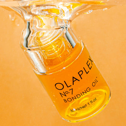 Olaplex No.7 Bonding Oil for hair care, 30ml bottle with dropper applicator, enhances shine and reduces frizz.
