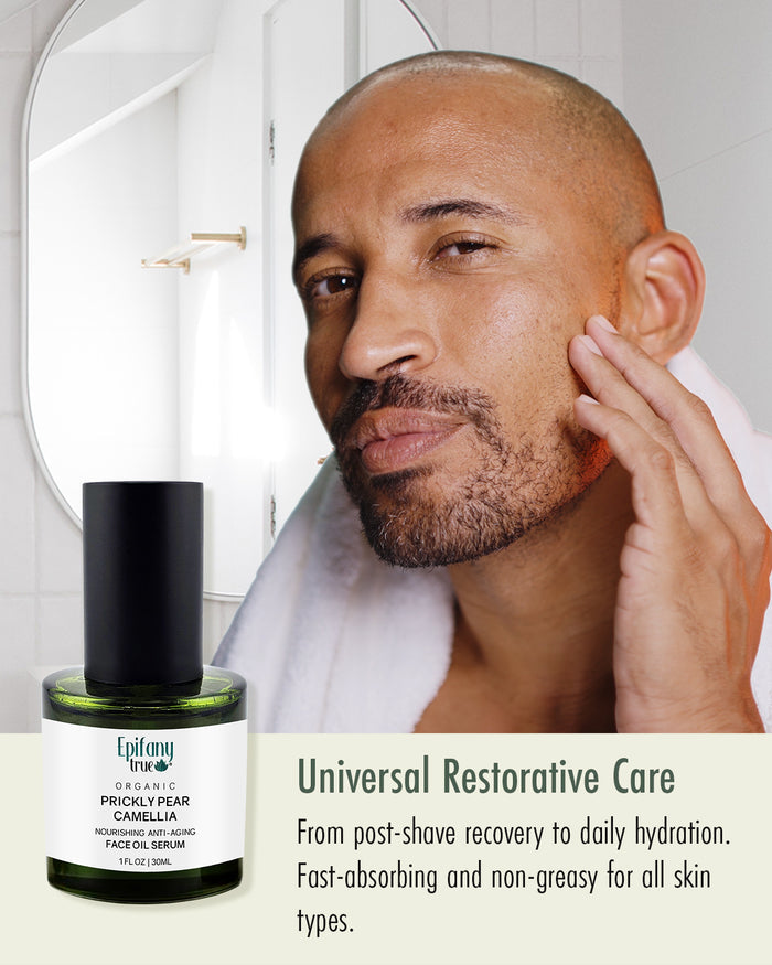 A man applying Epifany True face oil to his beard in a bright bathroom, showing the non-greasy, fast-absorbing unisex nature of the organic serum.