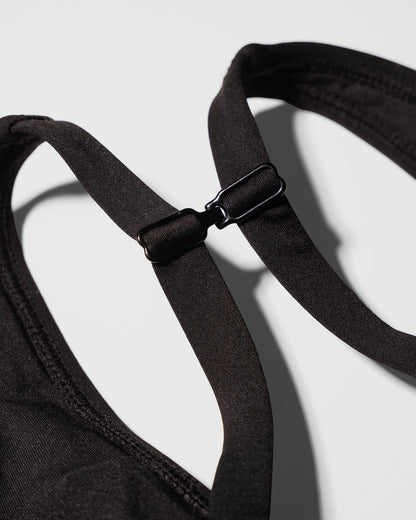 Close up flat lay of the racerback clip on Plungey - Black