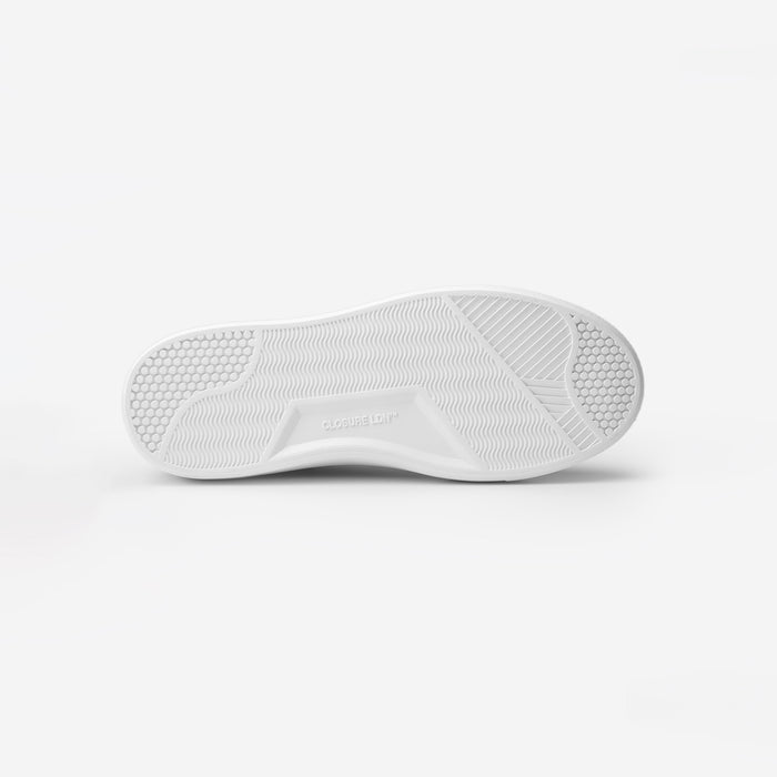 Sole view of the Premium Classic Trainer in White/Grey, showing the textured Closure LDN custom outsole and embossed branding.