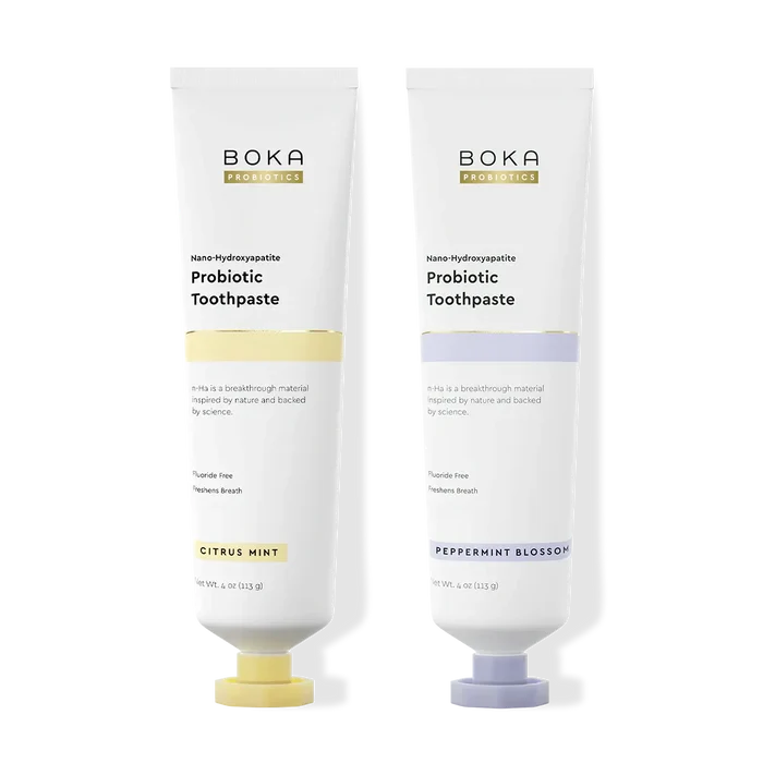 Two tubes of Boka Probiotic Toothpaste on a white background