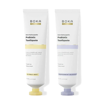 Two tubes of Boka Probiotic Toothpaste on a white background