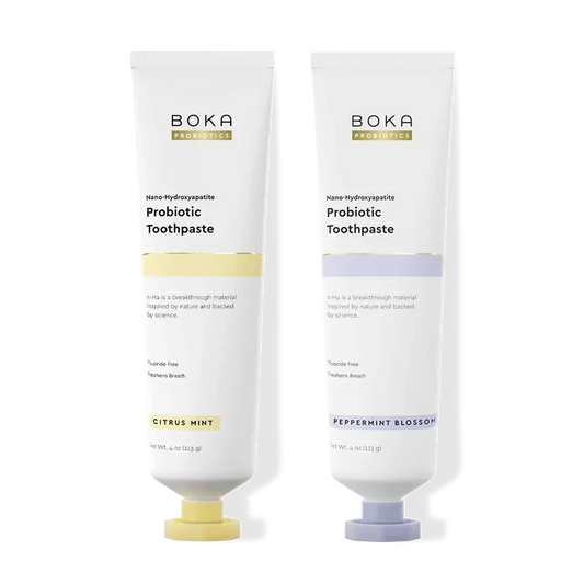 Two tubes of Boka Probiotic Toothpaste on a white background