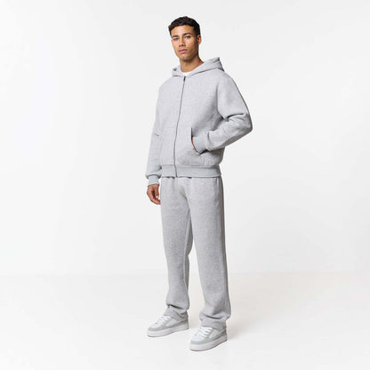 Grey marl zip up hoodie paired with straight leg joggers