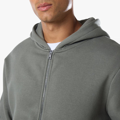 Close up of zip detailing on tracksuit top