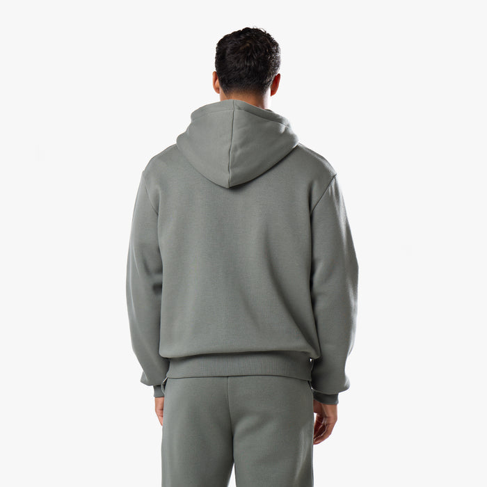 Rear view of relaxed hoodie showcasing oversized hood