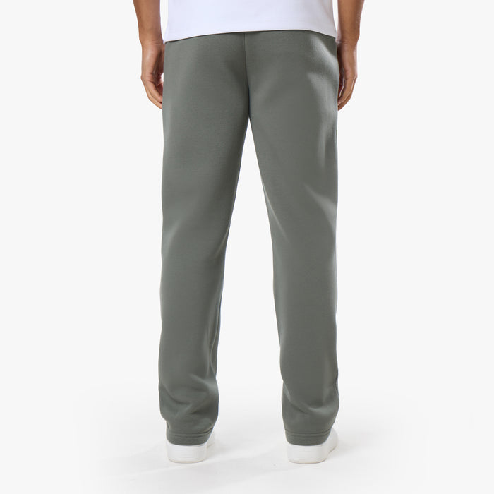 Rear view of relaxed fit khaki tracksuit bottoms