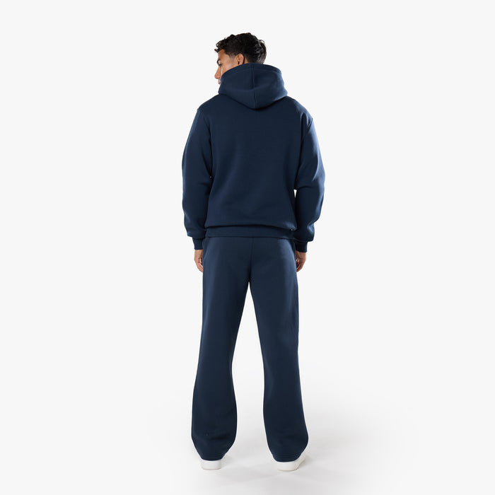 Full rear view of relaxed fit tracksuit in navy