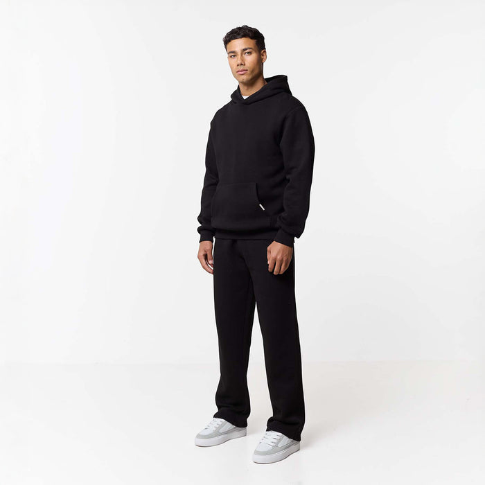 Front view of mens relaxed fit tracksuit in black
