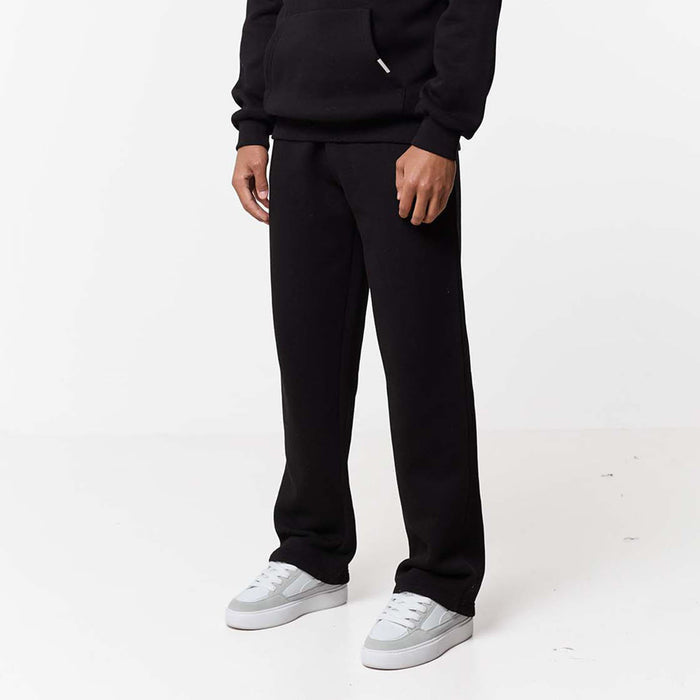 Relaxed fit tracksuit bottoms paired with white trainers