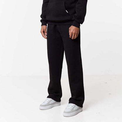 Relaxed fit tracksuit bottoms paired with white trainers