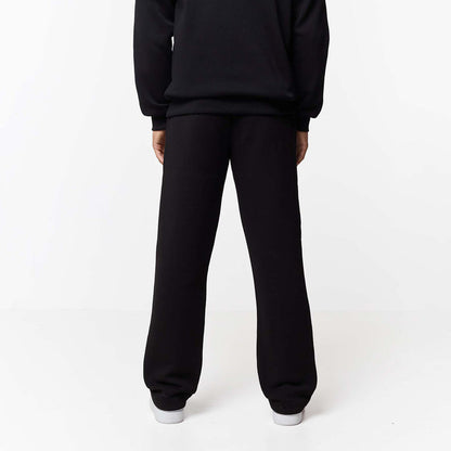 Rear view of mens black straight leg tracksuit bottoms