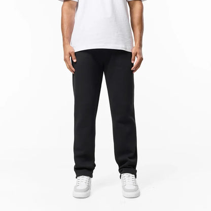 Relaxed fit tracksuit bottoms in Black with straight leg