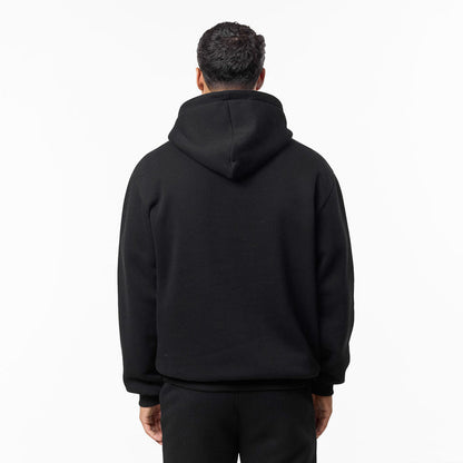 Rear view of black relaxed hoodie