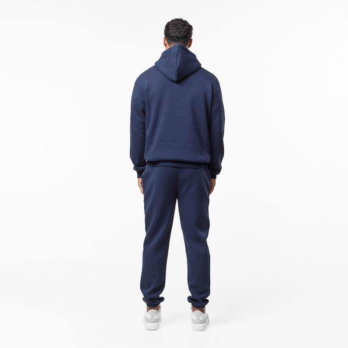 Full rear view of relaxed navy tracksuit