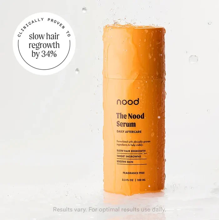 Nood Serum daily aftercare bottle with clinically proven to slow hair regrowth by 34% badge, splashing in water