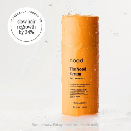 Nood Serum daily aftercare bottle with clinically proven to slow hair regrowth by 34% badge, splashing in water