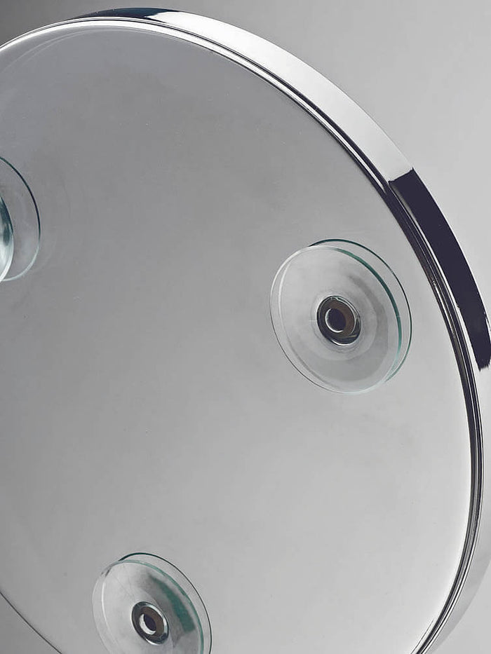 Three strong suction cups on each Decor Walther suction-cup mirror.