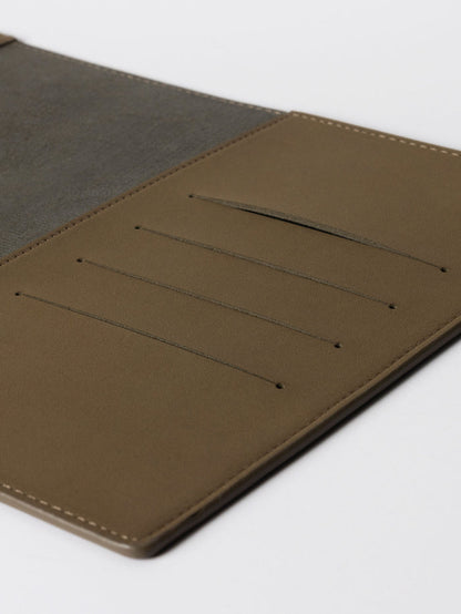Closeup of folio. Four credit card slots are visible. Color shown is Cipher.
