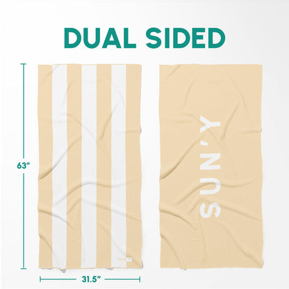 Waffle Microfiber Beach Towel - Natural Sand | SUN'Y shown dual sided with one side featuring white and natural sand stripes and the other side solid natural sand color with white SUN'Y logo.