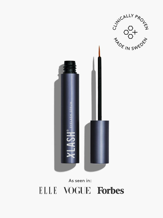 Xlash Eyelash Serum 3 ml for longer, natural-looking eyelashes, shown in a sleek packaging with applicator brush.